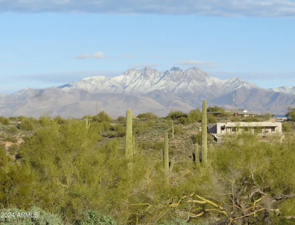 a view of a lake with mountains in the background