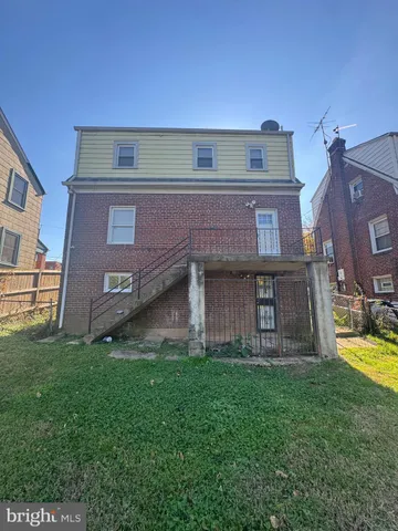 a view of a house with a swimming pool