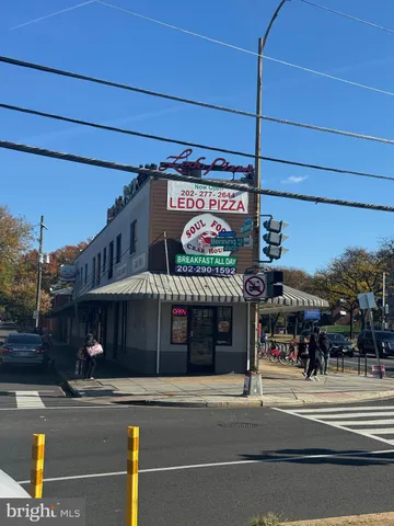a view of a building with a street