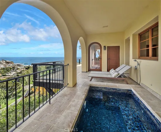 a view of a balcony with furniture
