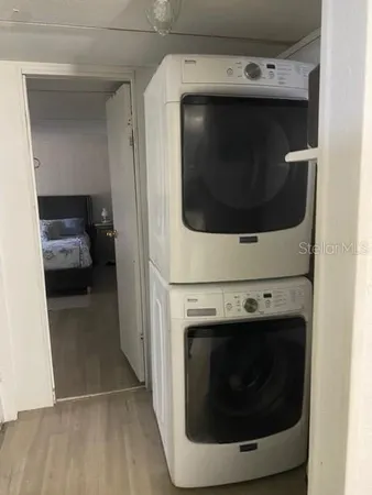 a utility room with washing machine