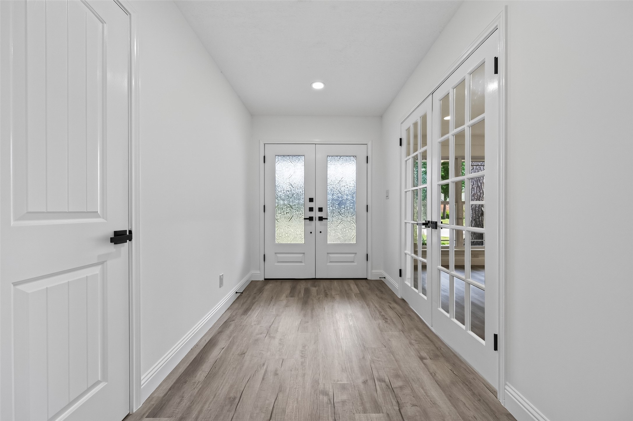 15402 Ripplestream Drive Houston, TX 77068 - Photo 5 of 50 The bright and inviting entryway with usher you either to the main family room or if you make a sharp left there at the glass faced double french doors, you will have arrived at the home office/study.