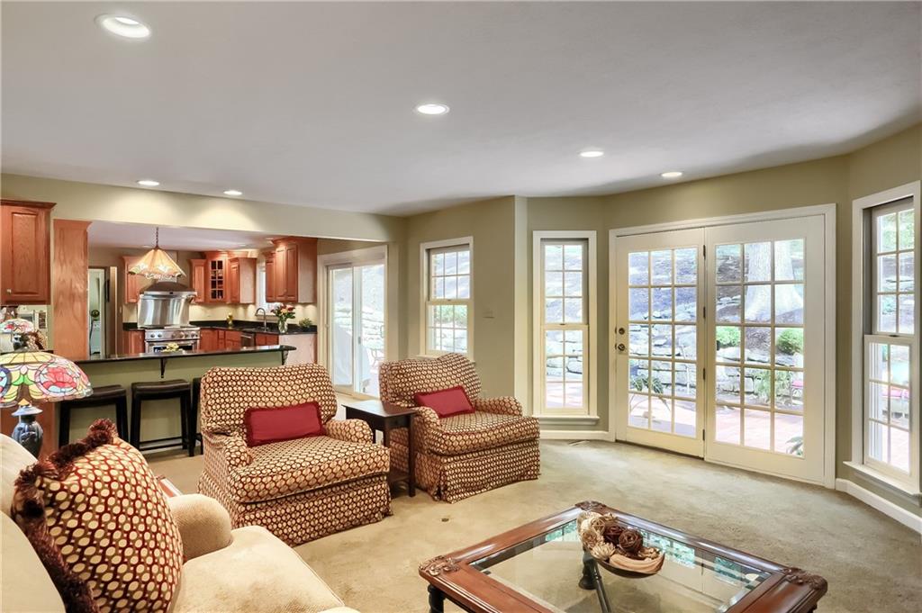 119 Berwyn Road Pittsburgh, PA 15237 - Photo 11 of 25 a living room with furniture and a floor to ceiling window