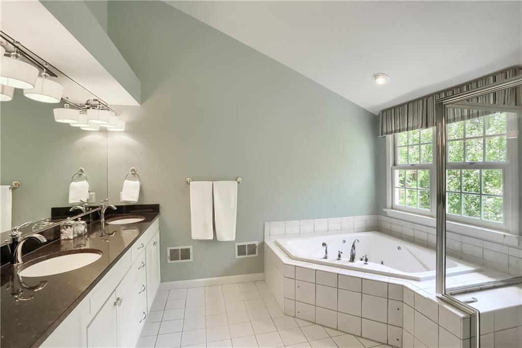 119 Berwyn Road Pittsburgh, PA 15237 - Photo 18 of 25 a large spacious bathroom with a large tub sink and mirror