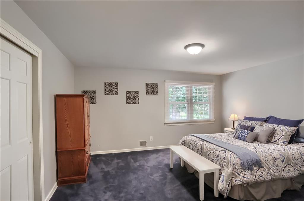 119 Berwyn Road Pittsburgh, PA 15237 - Photo 21 of 25 a bedroom with a bed and a window