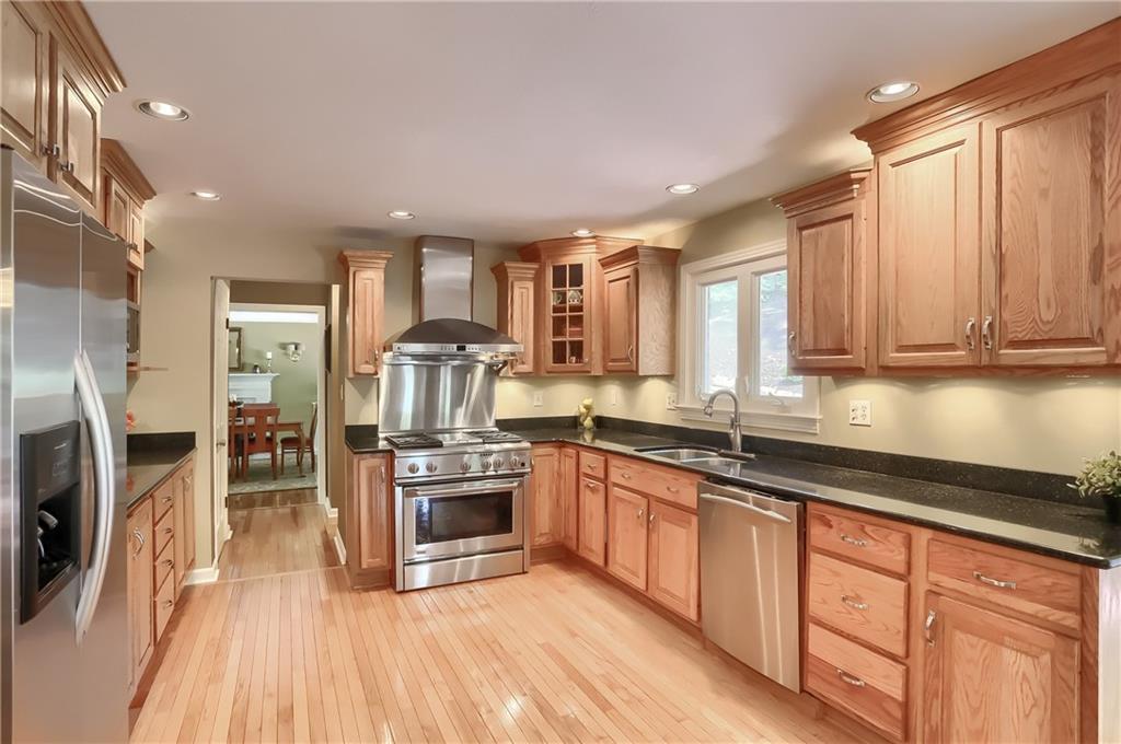 119 Berwyn Road Pittsburgh, PA 15237 - Photo 8 of 25 a kitchen with stainless steel appliances granite countertop a stove and a sink