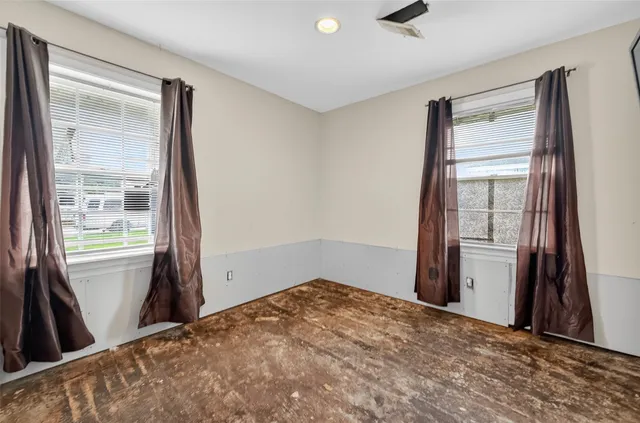 a view of empty room with front door