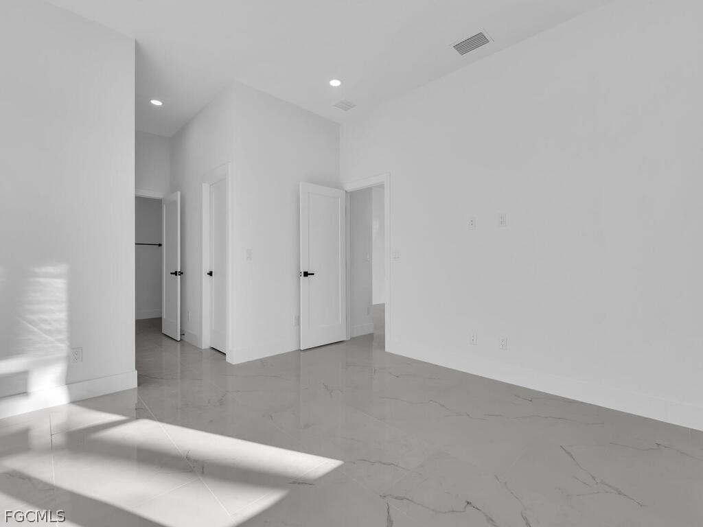 1839 Lockhaven Court Lehigh Acres, FL 33972 - Photo 11 of 23 a view of an empty room