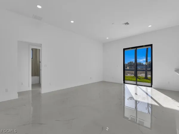 an empty room with windows