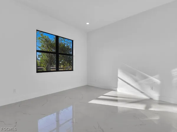 an empty room with windows