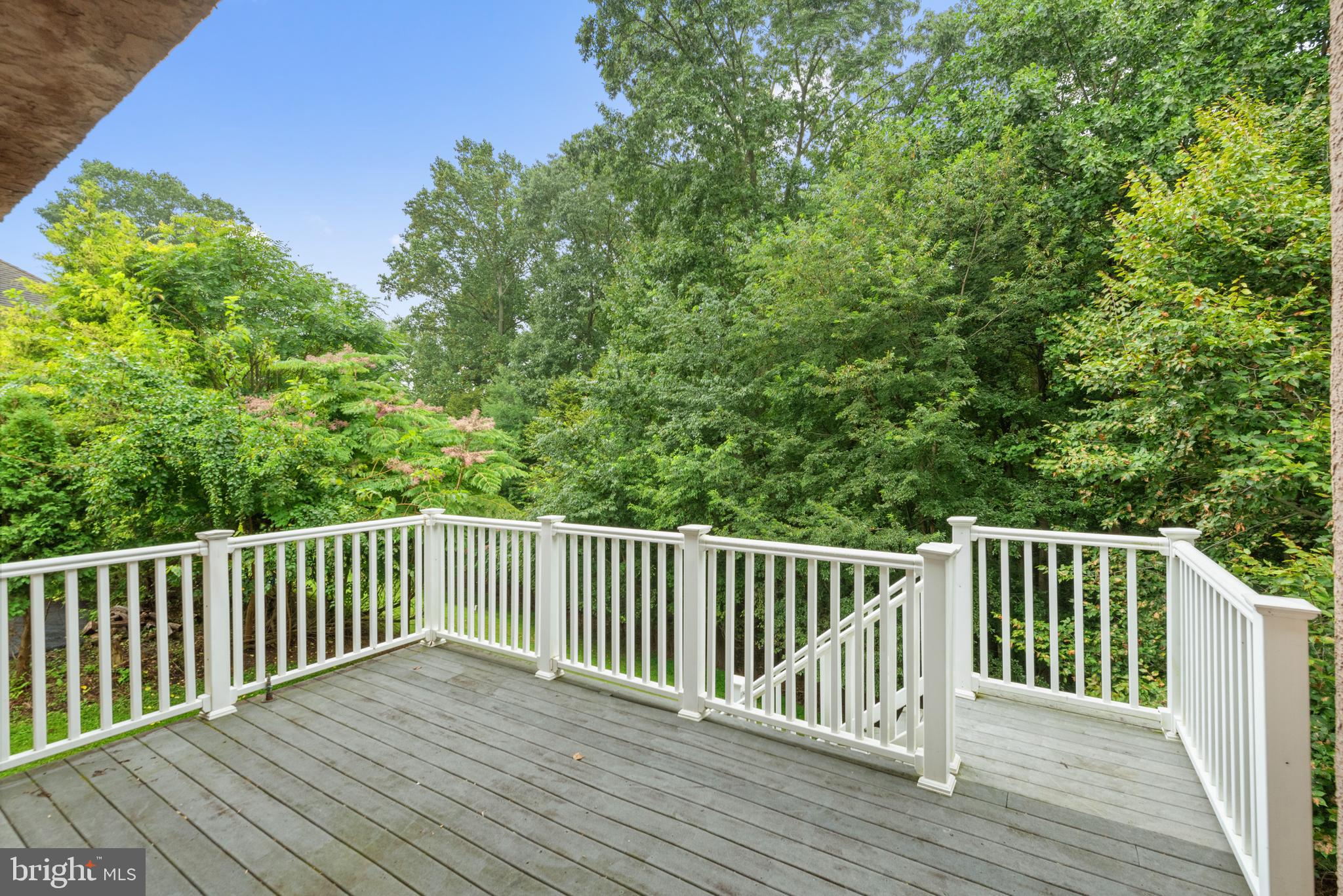 746 Kelli Lane Springfield, PA 19064 - Photo 32 of 35 Composite deck with stairs to access the yard