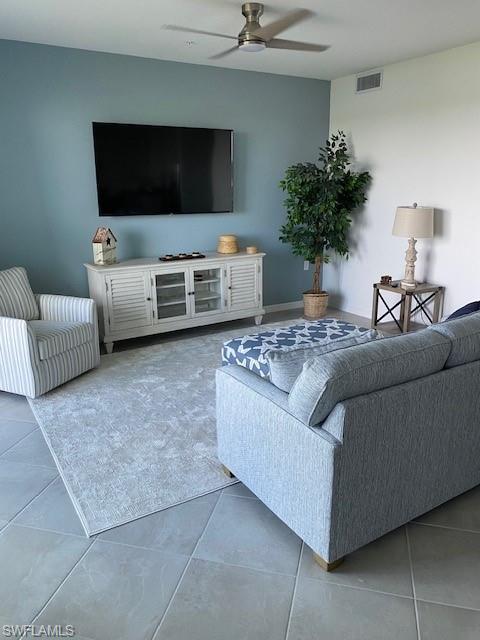 15275 Grn Acrs Avenue, Unit 337 Punta Gorda, FL 33982 - Photo 1 of 17 a living room with furniture and a flat screen tv