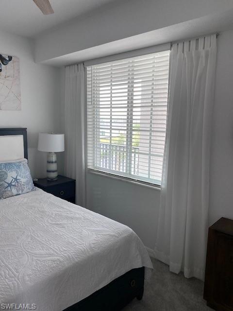 15275 Grn Acrs Avenue, Unit 337 Punta Gorda, FL 33982 - Photo 15 of 17 a bedroom with a bed and a window