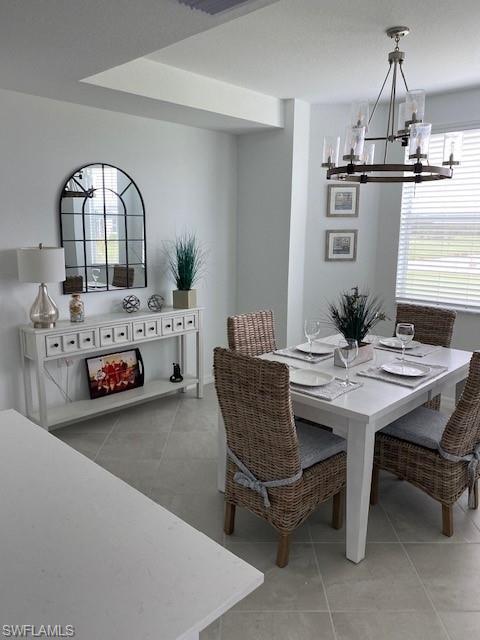 15275 Grn Acrs Avenue, Unit 337 Punta Gorda, FL 33982 - Photo 4 of 17 a view of a dining room with furniture and window