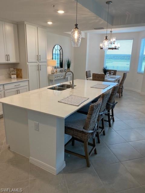 15275 Grn Acrs Avenue, Unit 337 Punta Gorda, FL 33982 - Photo 6 of 17 a large kitchen with a table and chairs
