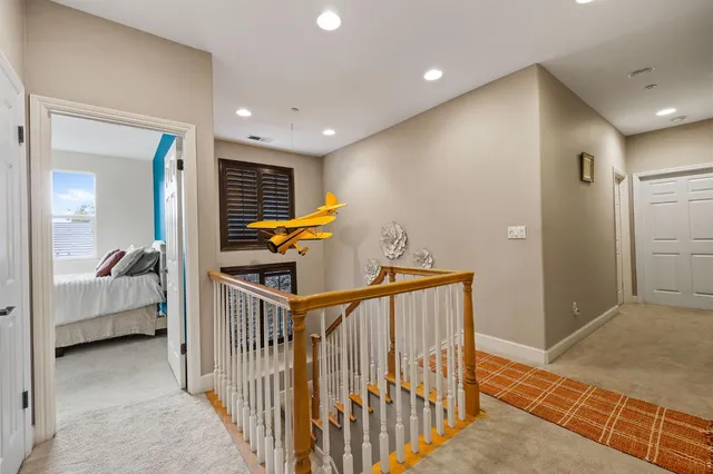 a view of entryway with bedroom and chandelier