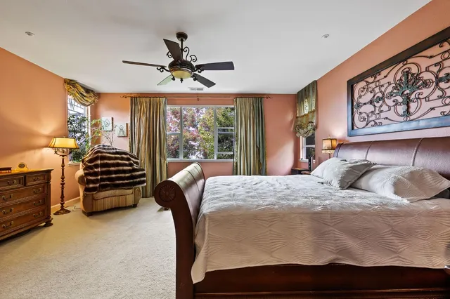 a bathroom with a sink double vanity and a mirror