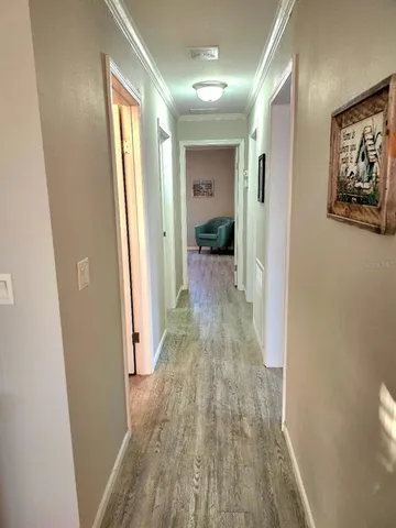 a bedroom with a bed and lamp