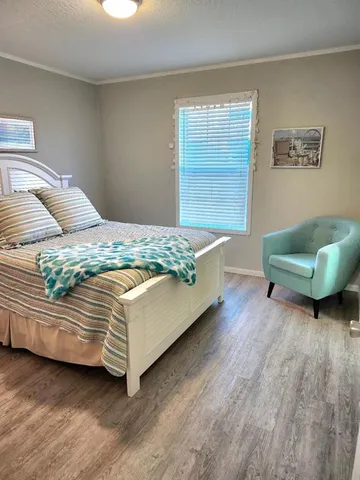 a bathroom with a sink a mirror and a toilet