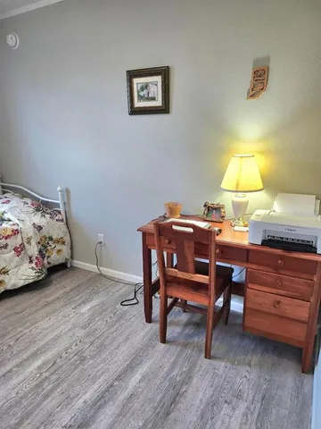 a view of storage and utility room with washer and dryer