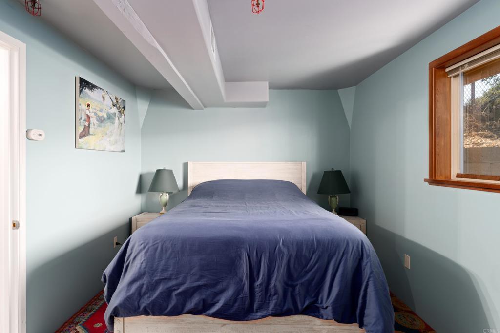 25770 East Grade Road Santa Ysabel, CA 92070 - Photo 34 of 75 a bedroom with a bed and window