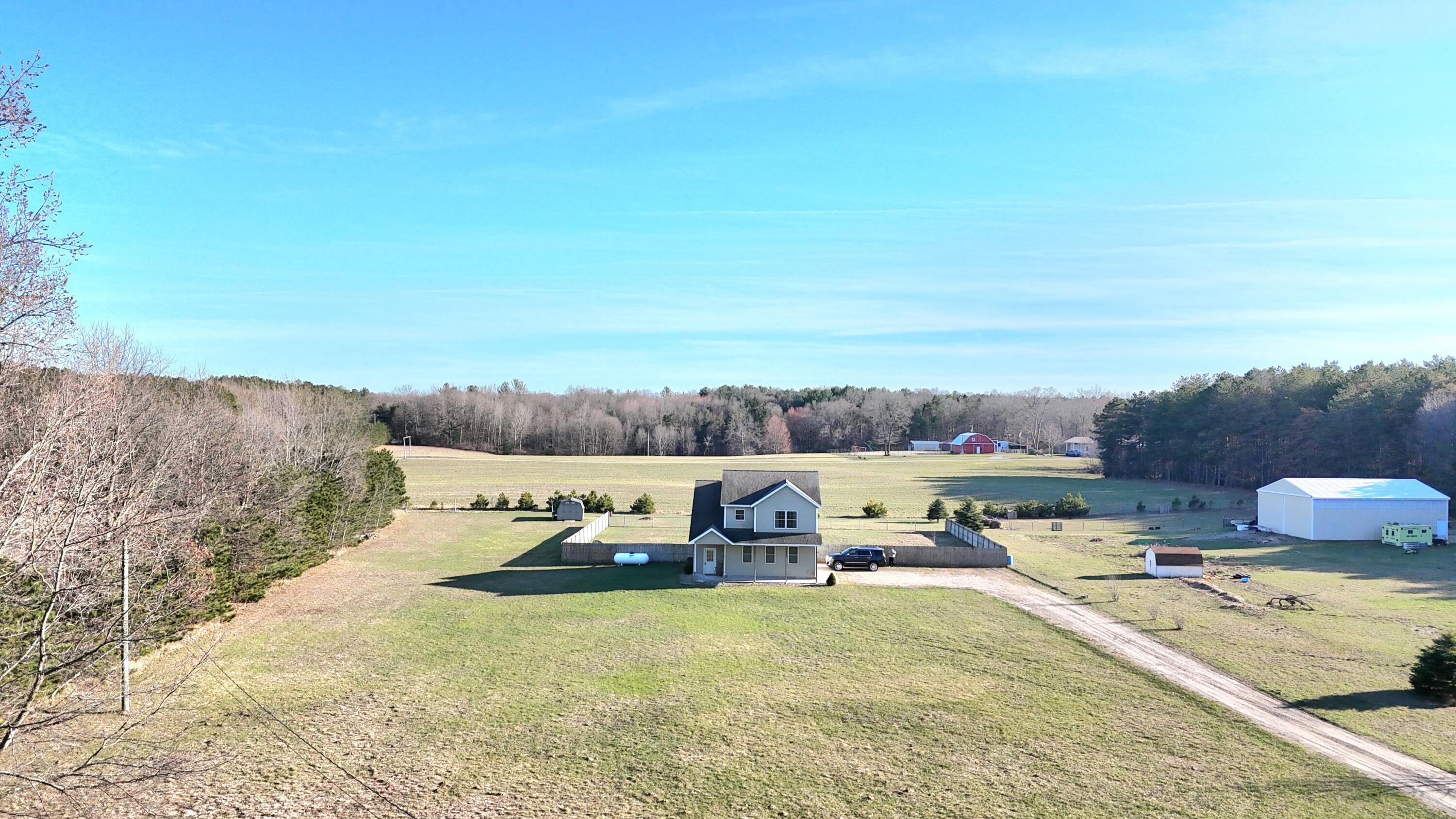 6039 Morris Lake Road Mears, MI 49436 - Photo 46 of 49 dji_fly_20250416_041734_0001_17449344005