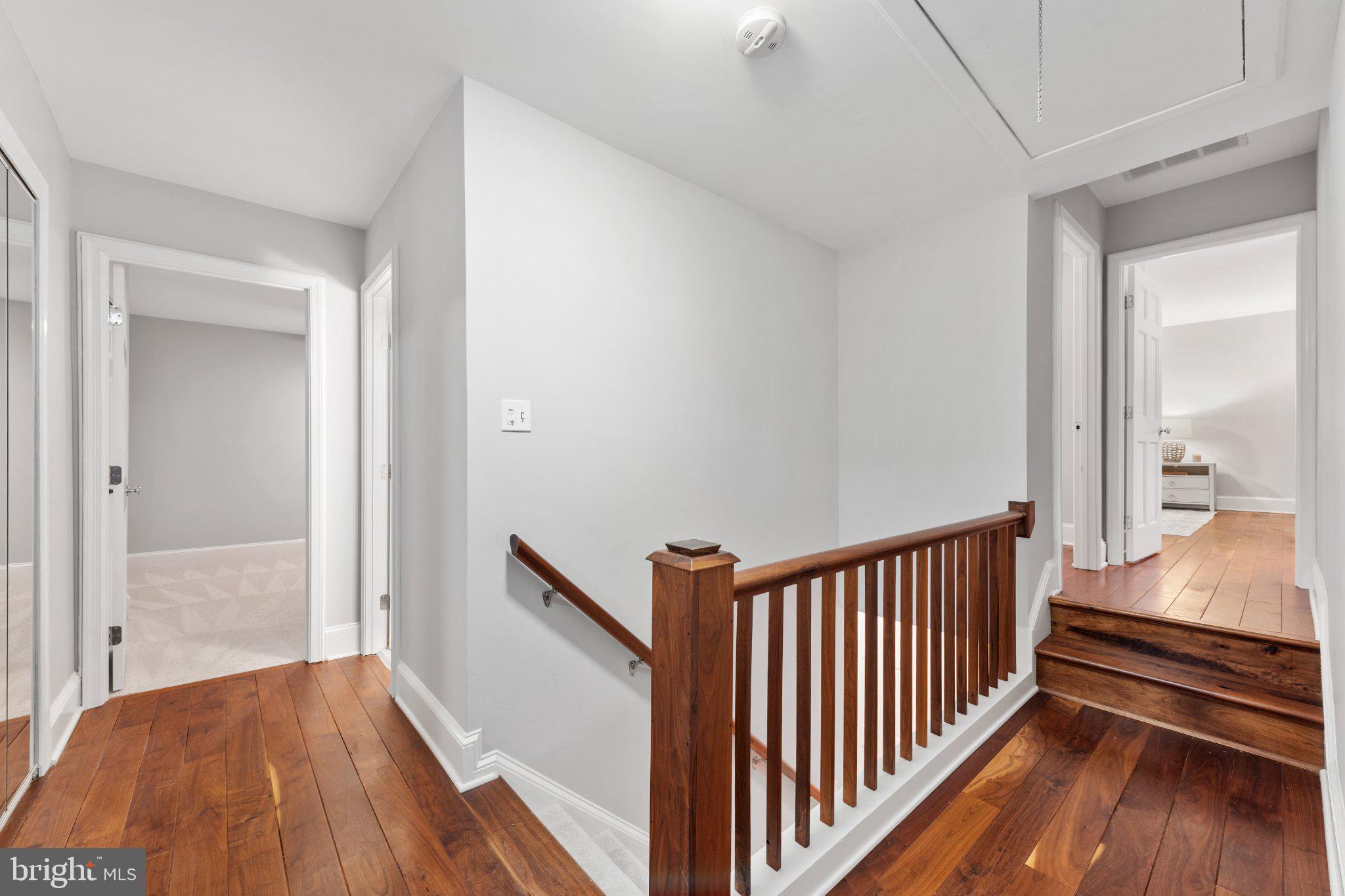 1427 Green Run Lane Reston, VA 20190 - Photo 22 of 44 Hardwood flrs in the upper hall and custom railing