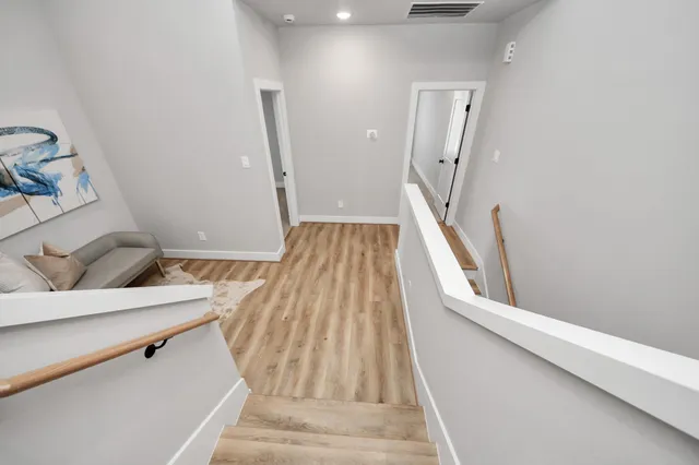 a view of wooden floor in a kitchen