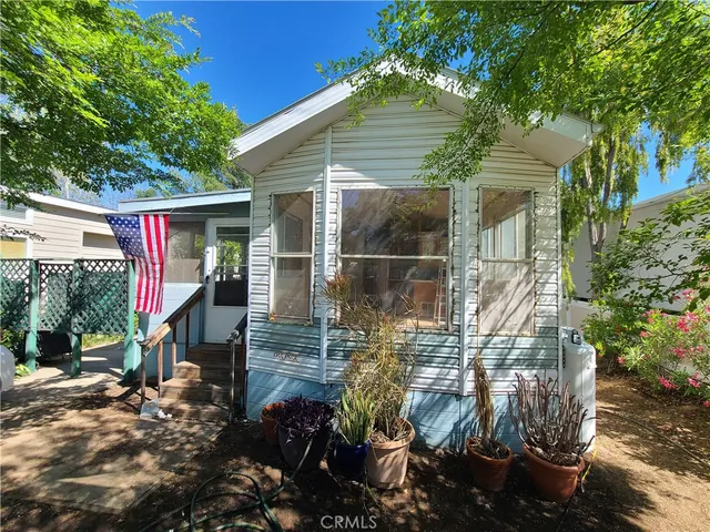 a house view with a backyard space