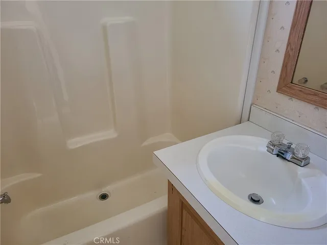 a bathroom with a sink and a tub