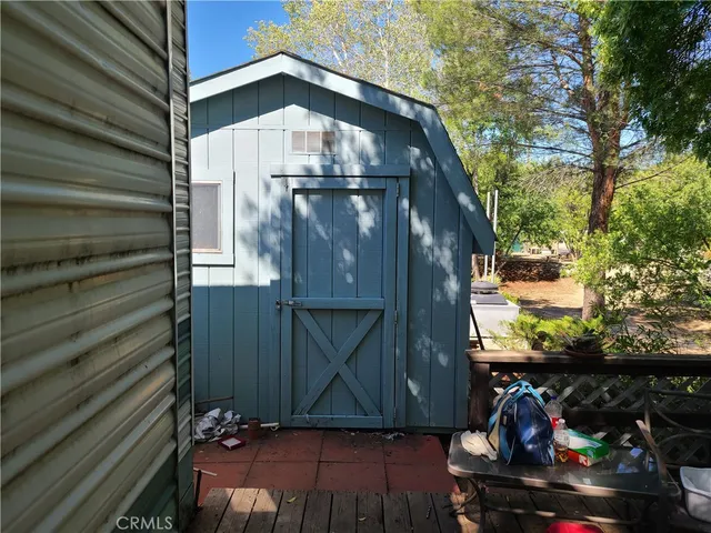 a view of a small house with roof gate