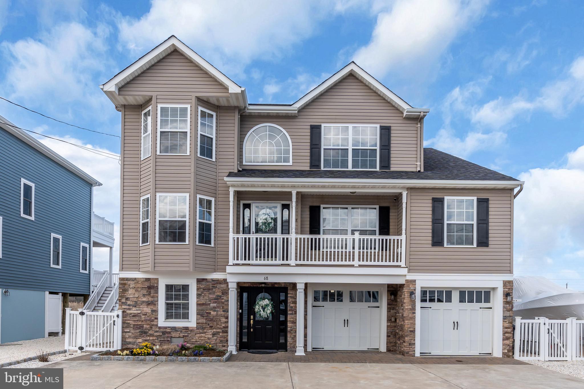68 Morris Boulevard Manahawkin, NJ 08050 - Photo 1 of 43 a front view of residential houses