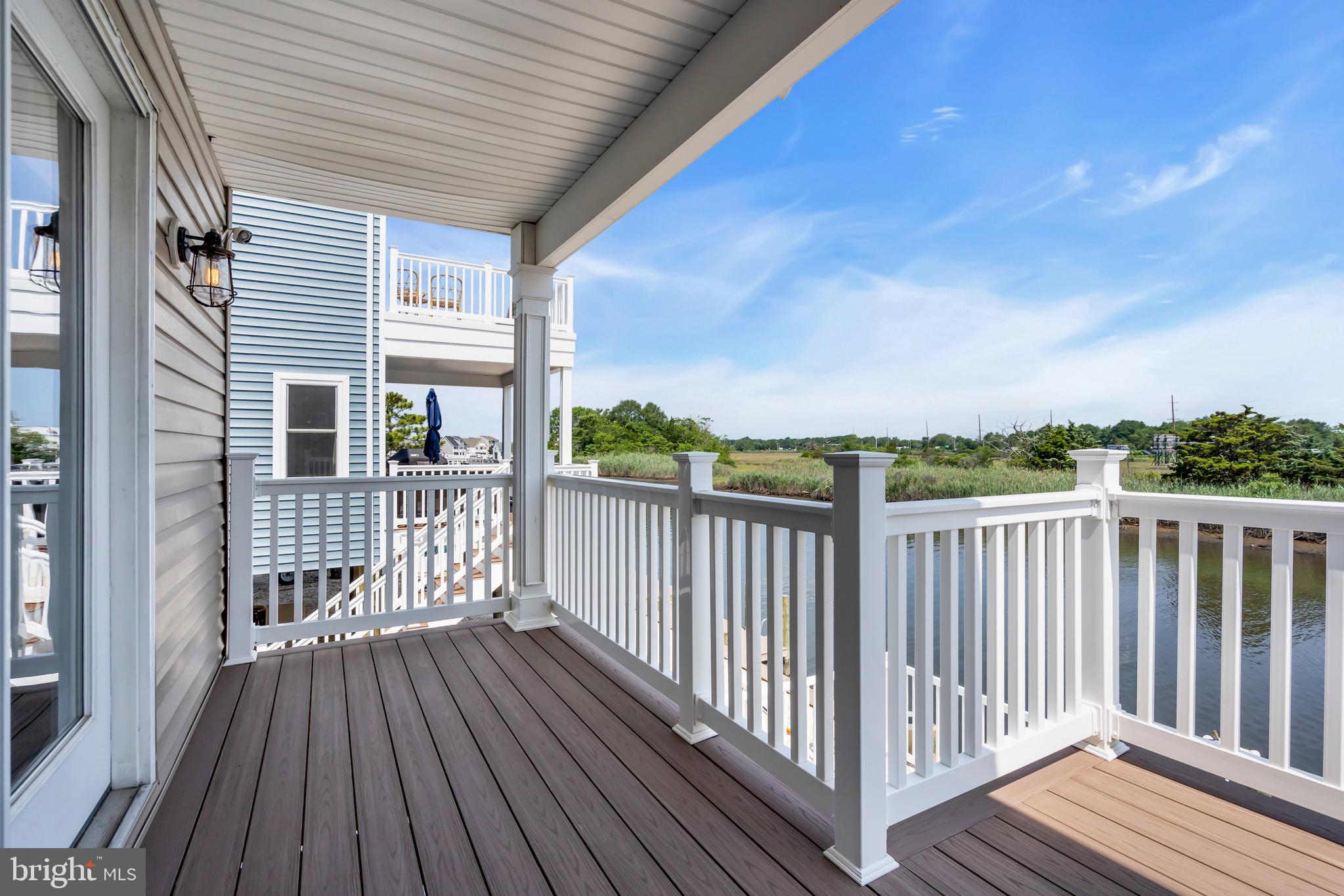68 Morris Boulevard Manahawkin, NJ 08050 - Photo 15 of 43 a view of a balcony with wooden floor