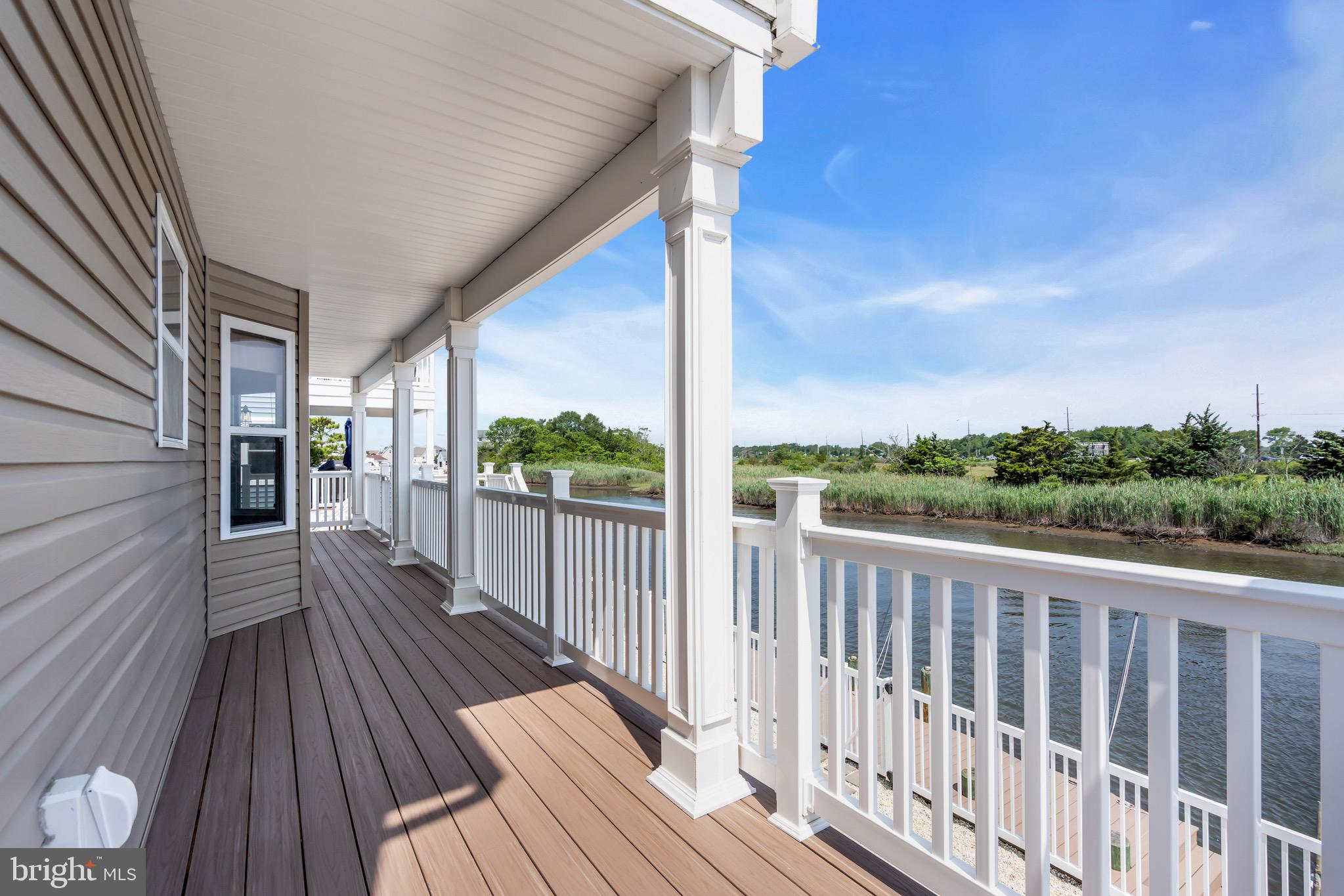 68 Morris Boulevard Manahawkin, NJ 08050 - Photo 16 of 43 a view of balcony with wooden floor