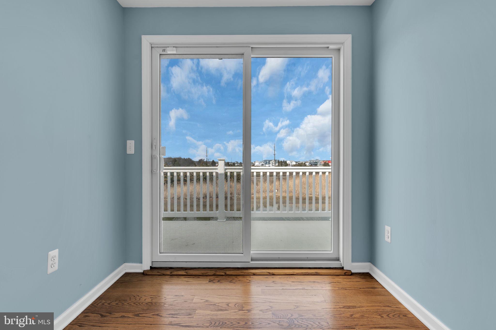 68 Morris Boulevard Manahawkin, NJ 08050 - Photo 29 of 43 a view of a small space with wooden floor and a window