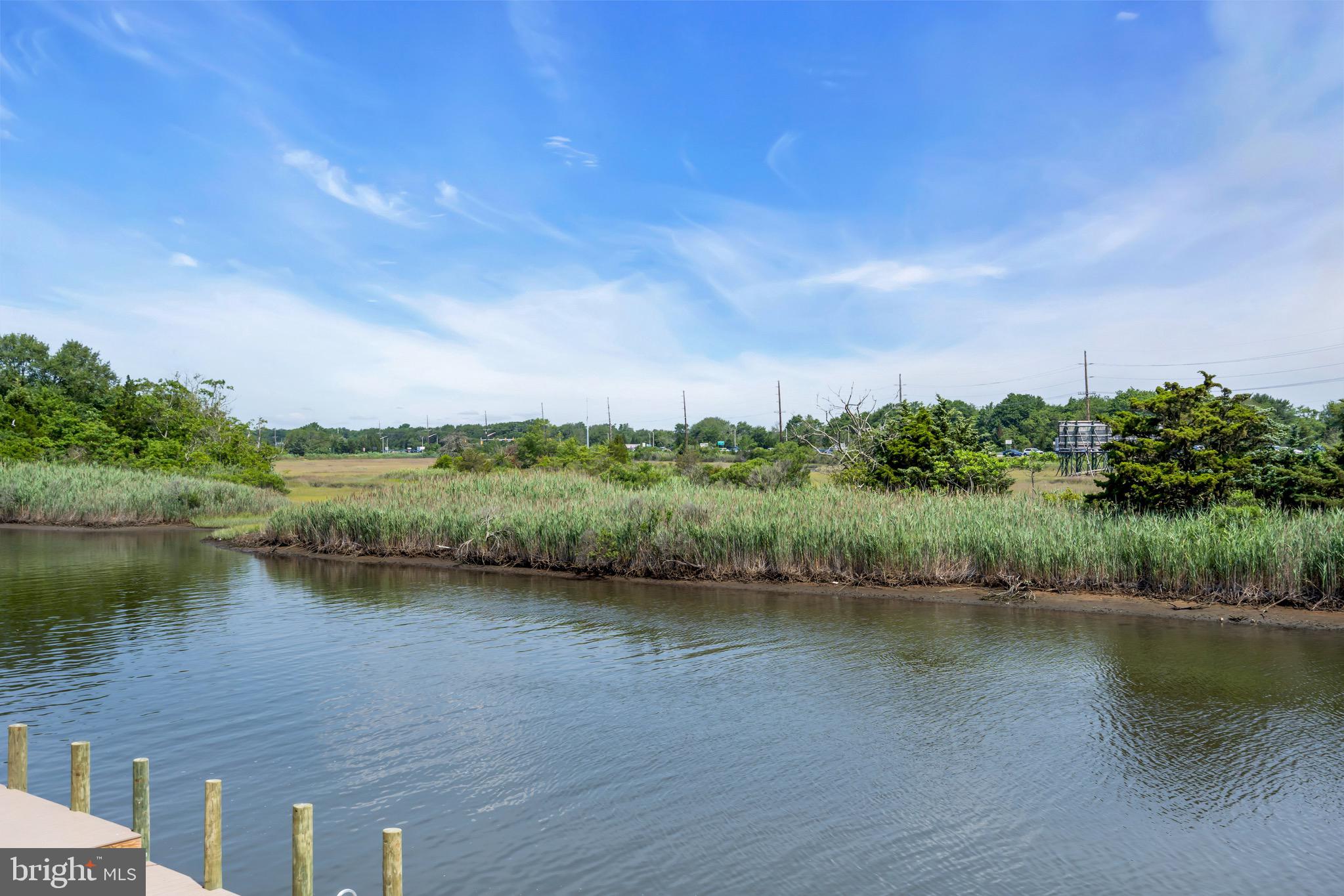 68 Morris Boulevard Manahawkin, NJ 08050 - Photo 40 of 43 a view of a lake with houses in the back