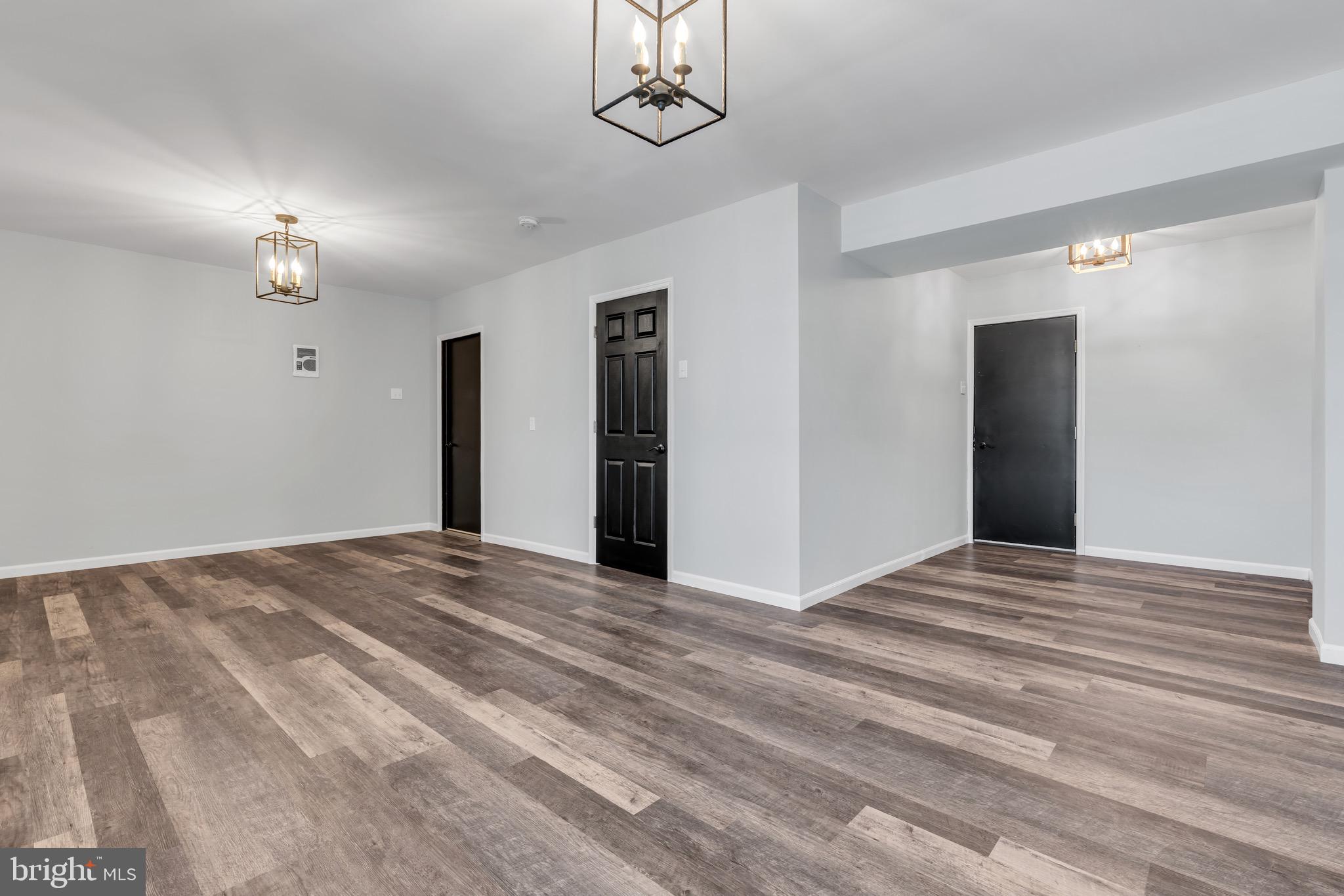 68 Morris Boulevard Manahawkin, NJ 08050 - Photo 5 of 43 a view of an empty room with a fireplace
