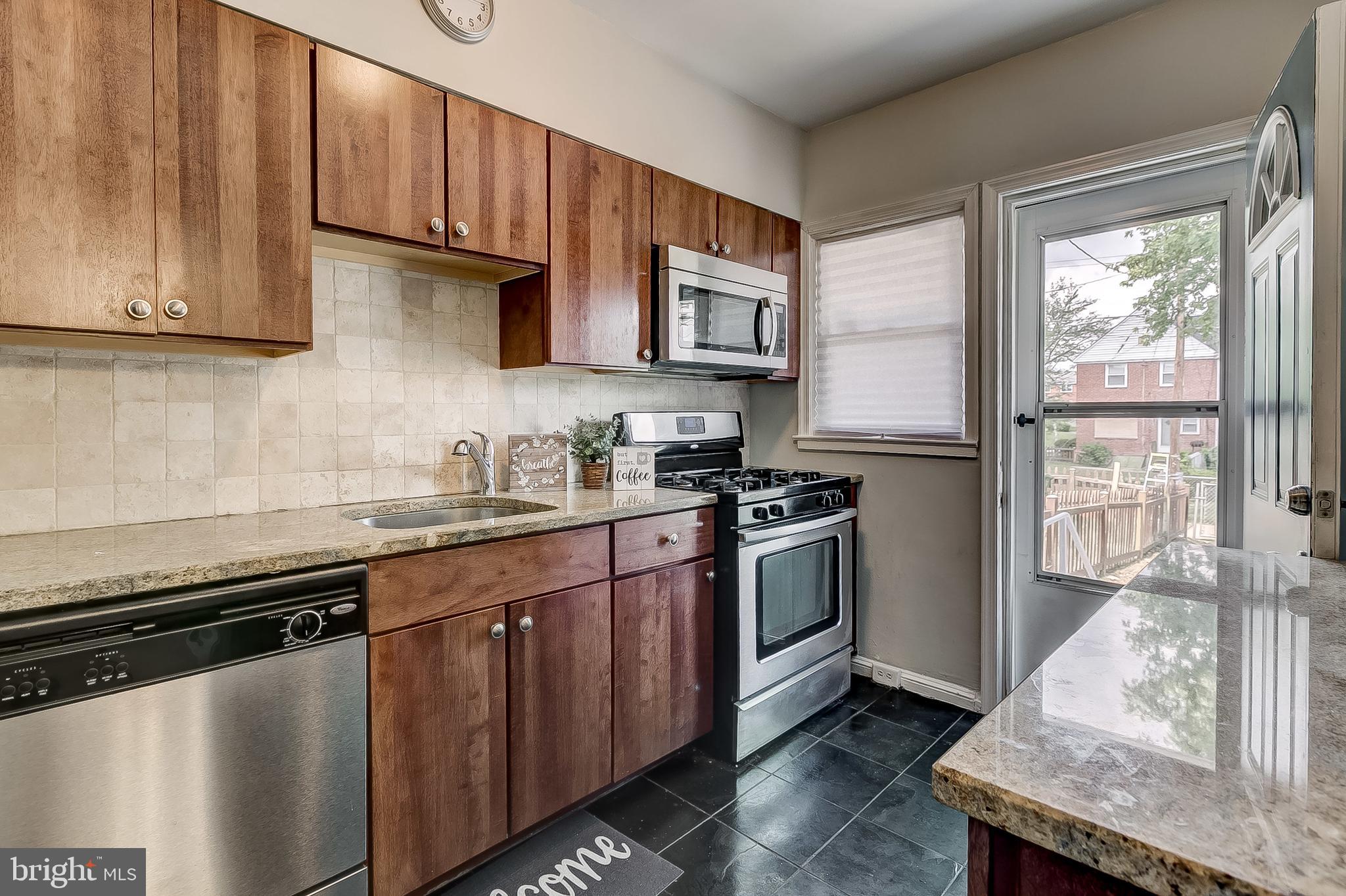 1306 Silverthorne Road Baltimore, MD 21239 - Photo 11 of 31 New Fixtures and Cabinetry Hardware!