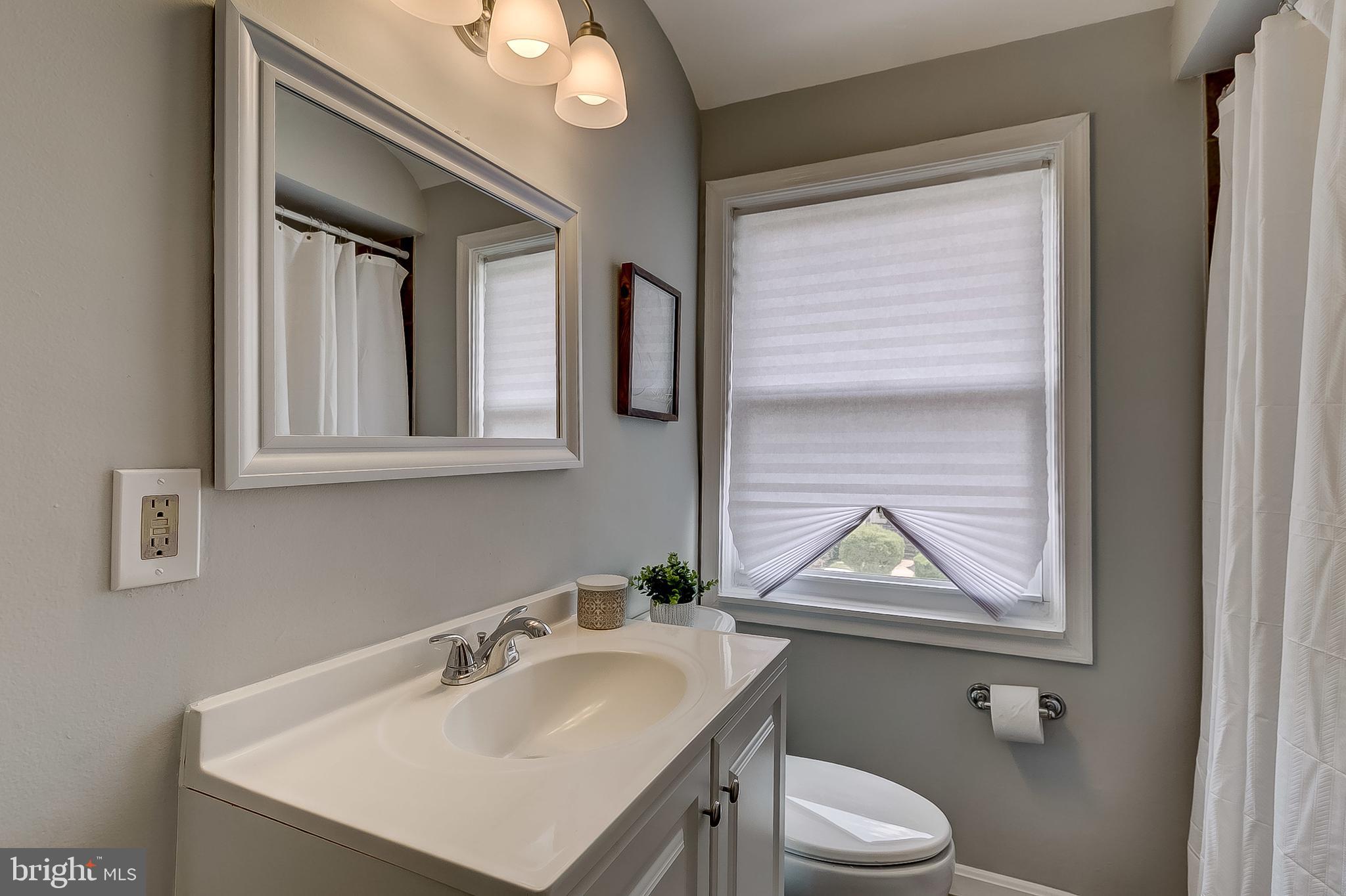 1306 Silverthorne Road Baltimore, MD 21239 - Photo 22 of 31 New: Light Fixture , Faucets, & Bathroom Hardward