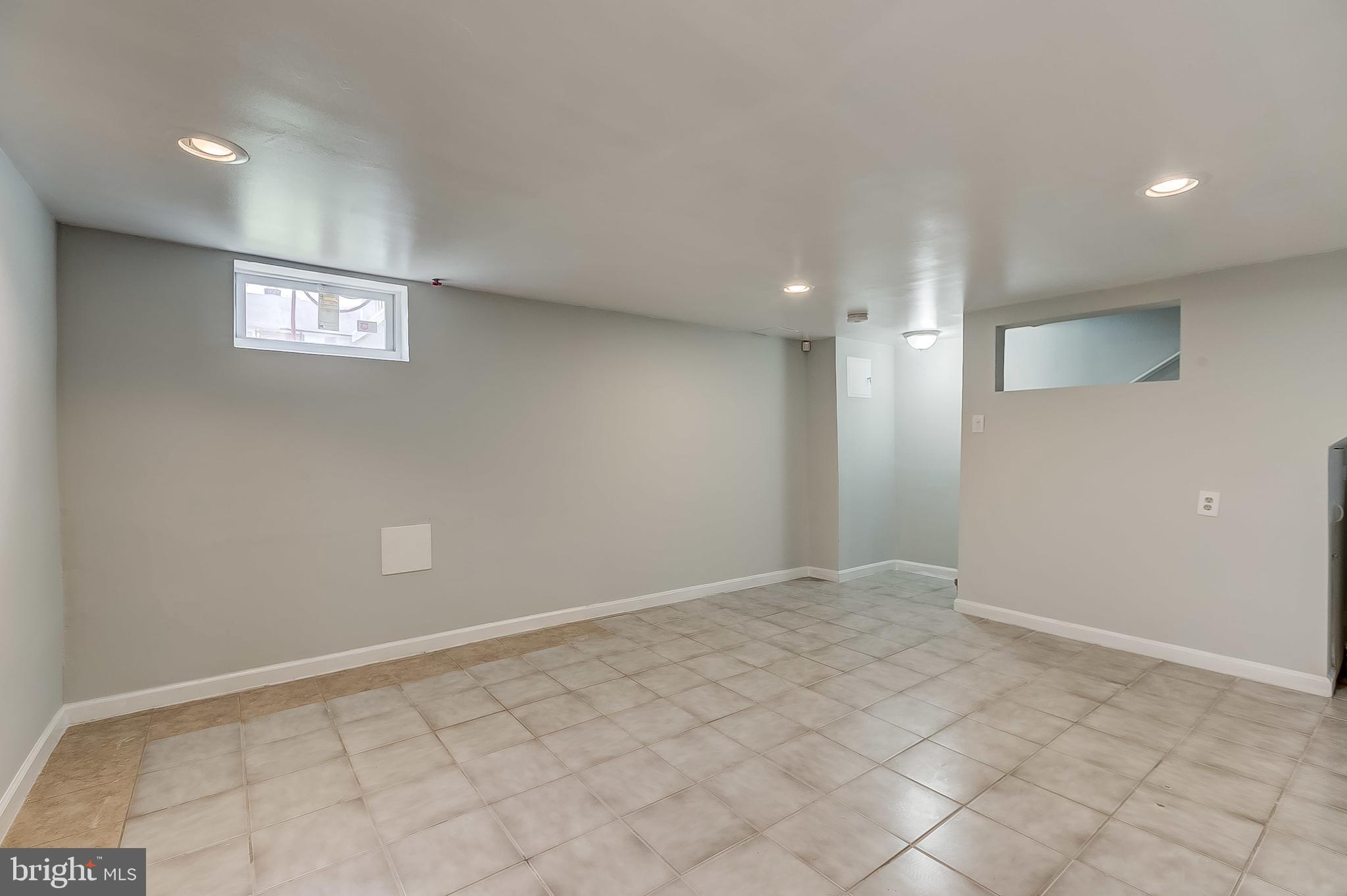 1306 Silverthorne Road Baltimore, MD 21239 - Photo 24 of 31 Spacious Finished Basement!