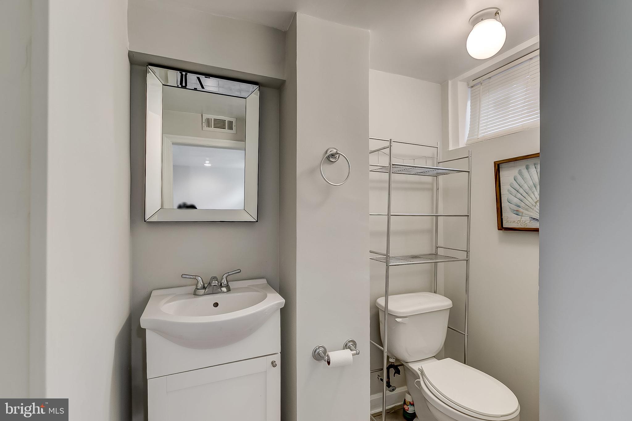 1306 Silverthorne Road Baltimore, MD 21239 - Photo 27 of 31 Refreshed Lower Level