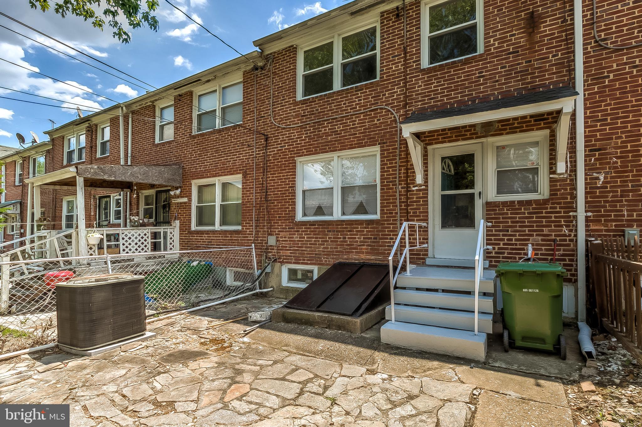 1306 Silverthorne Road Baltimore, MD 21239 - Photo 29 of 31 Relaxing Backyard, Highlighting Central Air Unit!
