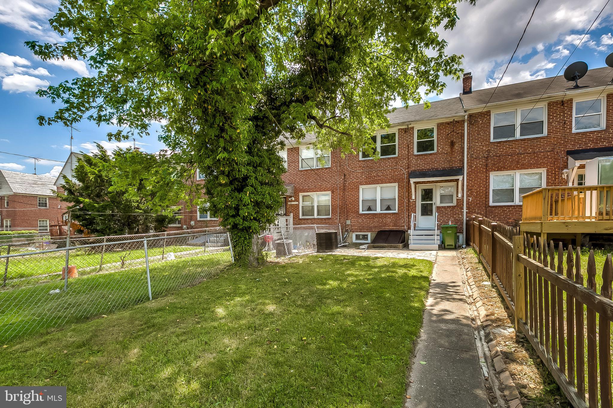1306 Silverthorne Road Baltimore, MD 21239 - Photo 31 of 31 Take in the Fresh Air, Under the Shade Tree!