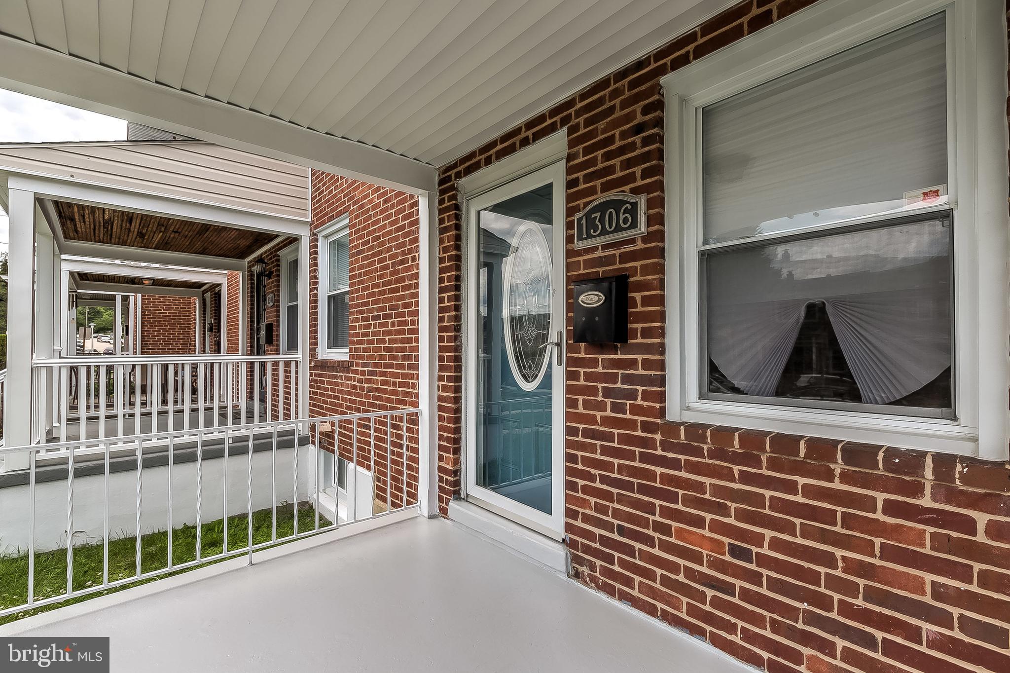 1306 Silverthorne Road Baltimore, MD 21239 - Photo 4 of 31 Refreshed Covered Front Porch!