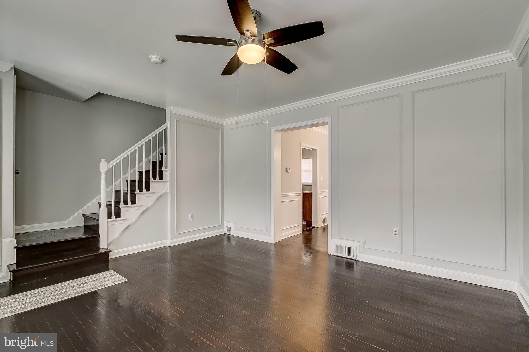 1306 Silverthorne Road Baltimore, MD 21239 - Photo 7 of 31 Rich Dark Hardwood Flooring that Compliments