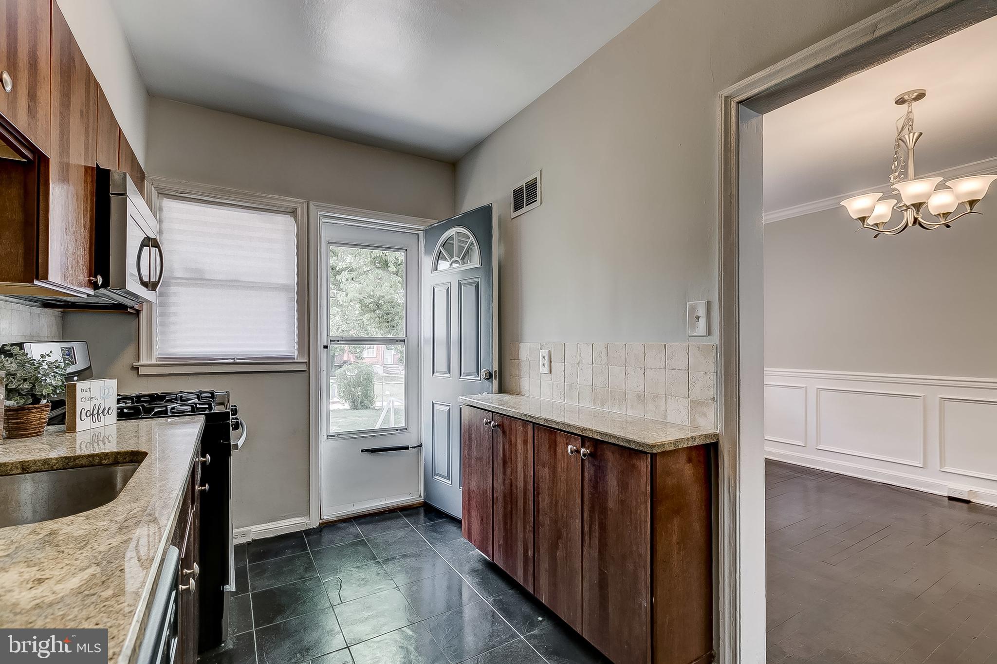 1306 Silverthorne Road Baltimore, MD 21239 - Photo 10 of 31 Plenty of Prep Space on Granite Countertops