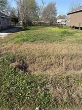 2640 Euclid Street Beaumont, TX 77705 - Photo 5 of 5 a view of a field with a small yard