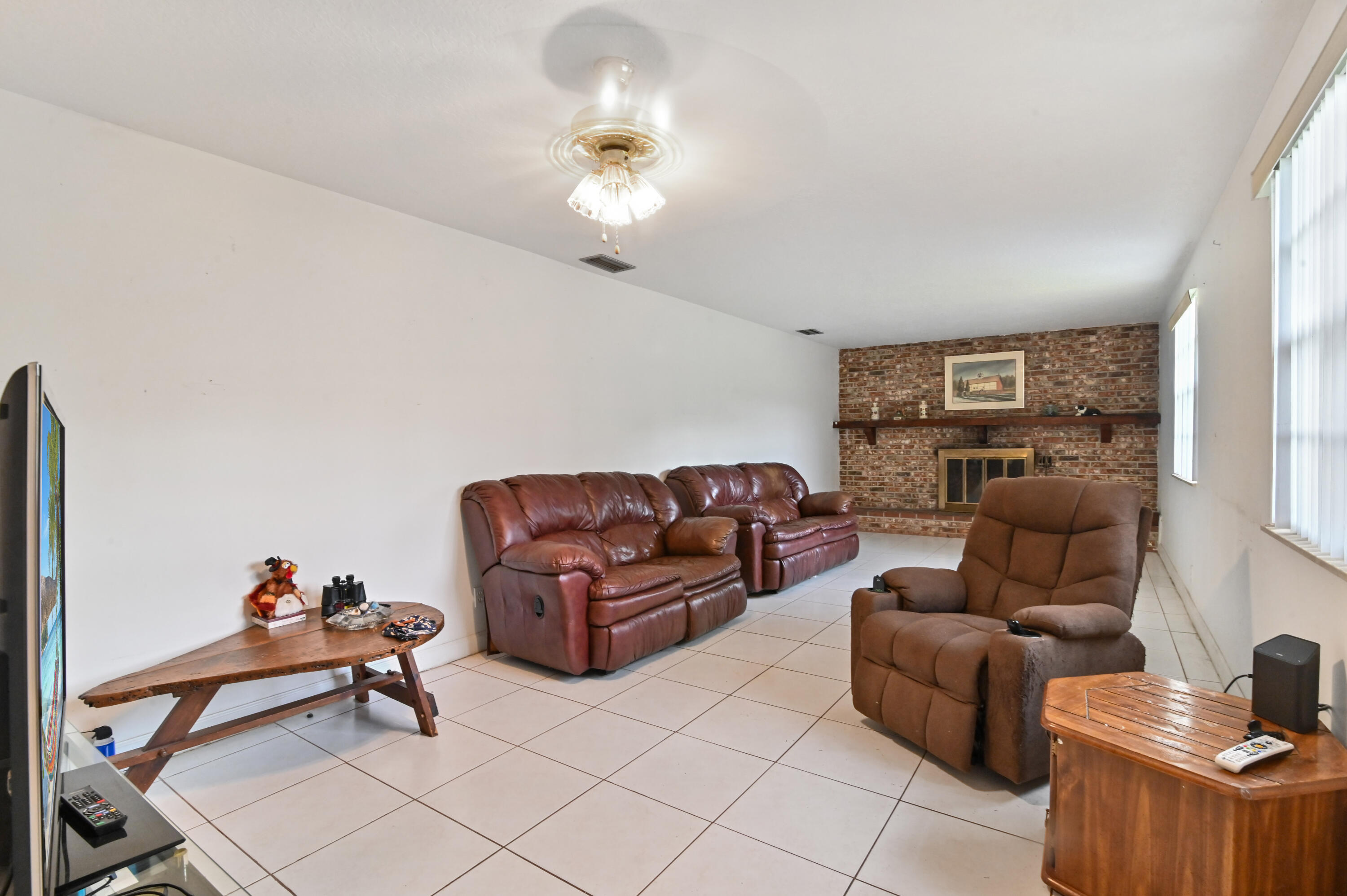 3208 A Road Loxahatchee Groves, FL 33470 - Photo 18 of 51 a living room with furniture