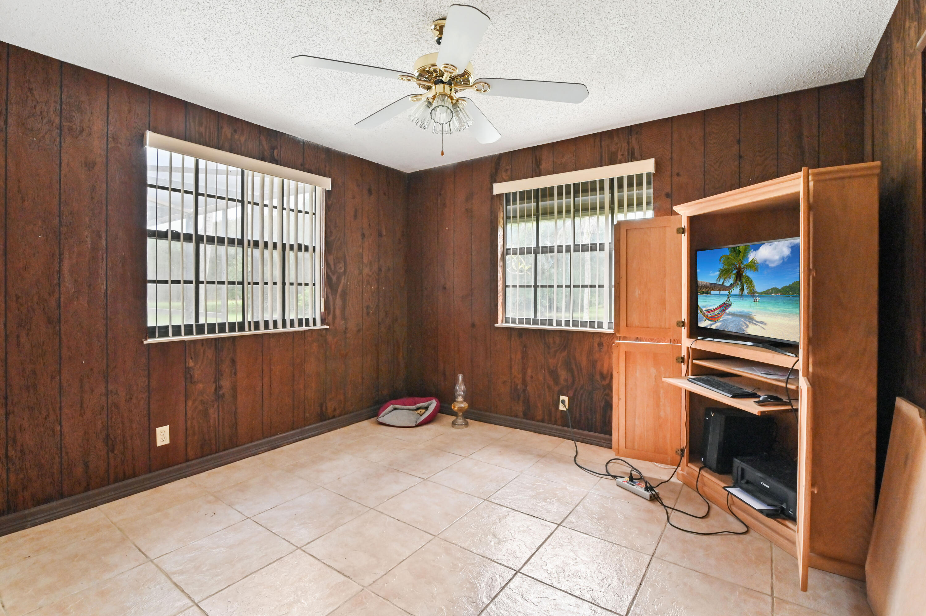 3208 A Road Loxahatchee Groves, FL 33470 - Photo 21 of 51 a view of livingroom with window