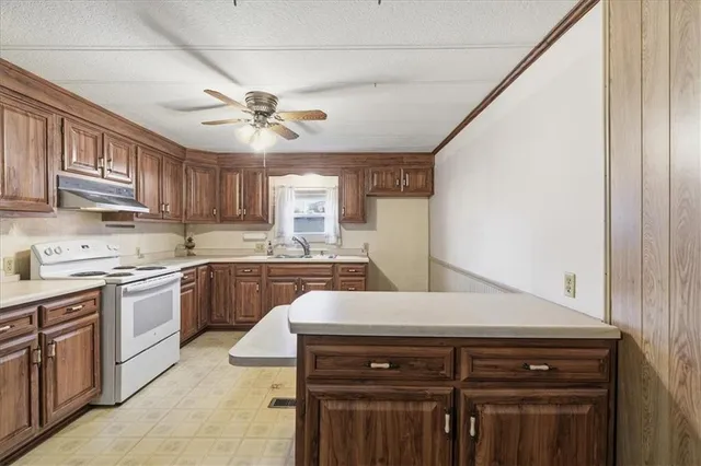 a view of elevator with hallway